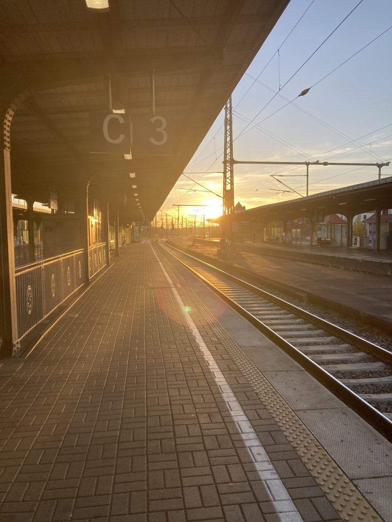 sunrise from a train station