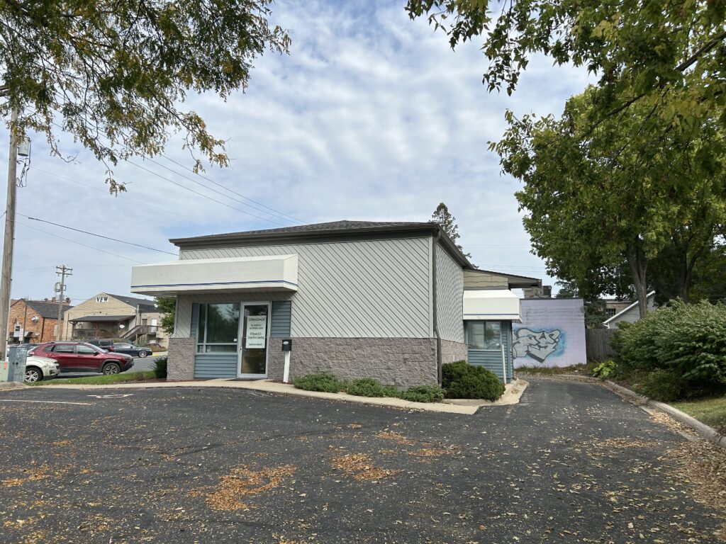 Empty building that has a drive-thru window
